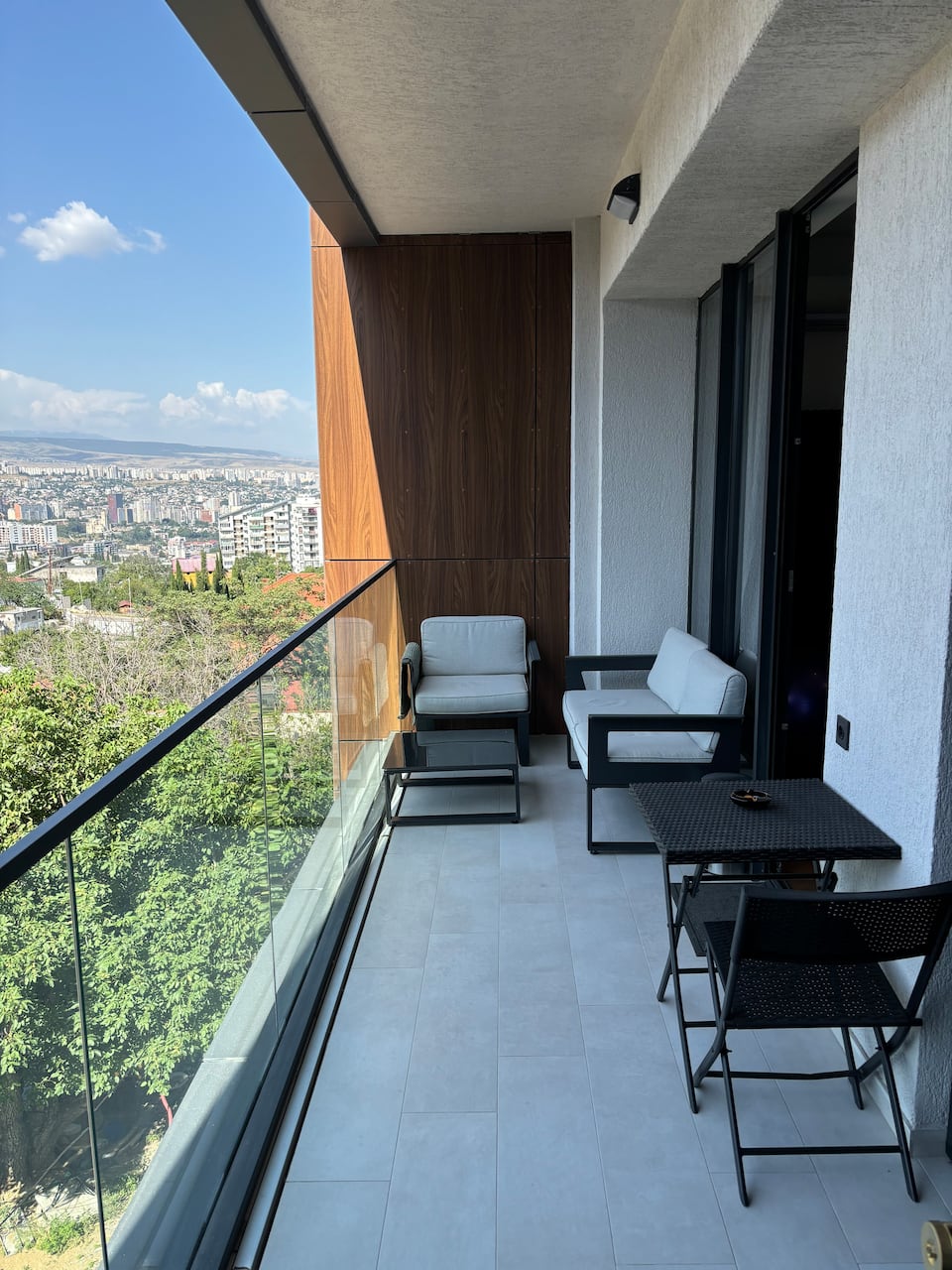 Balcony of an apartment in the complex with a view over Tbilisi